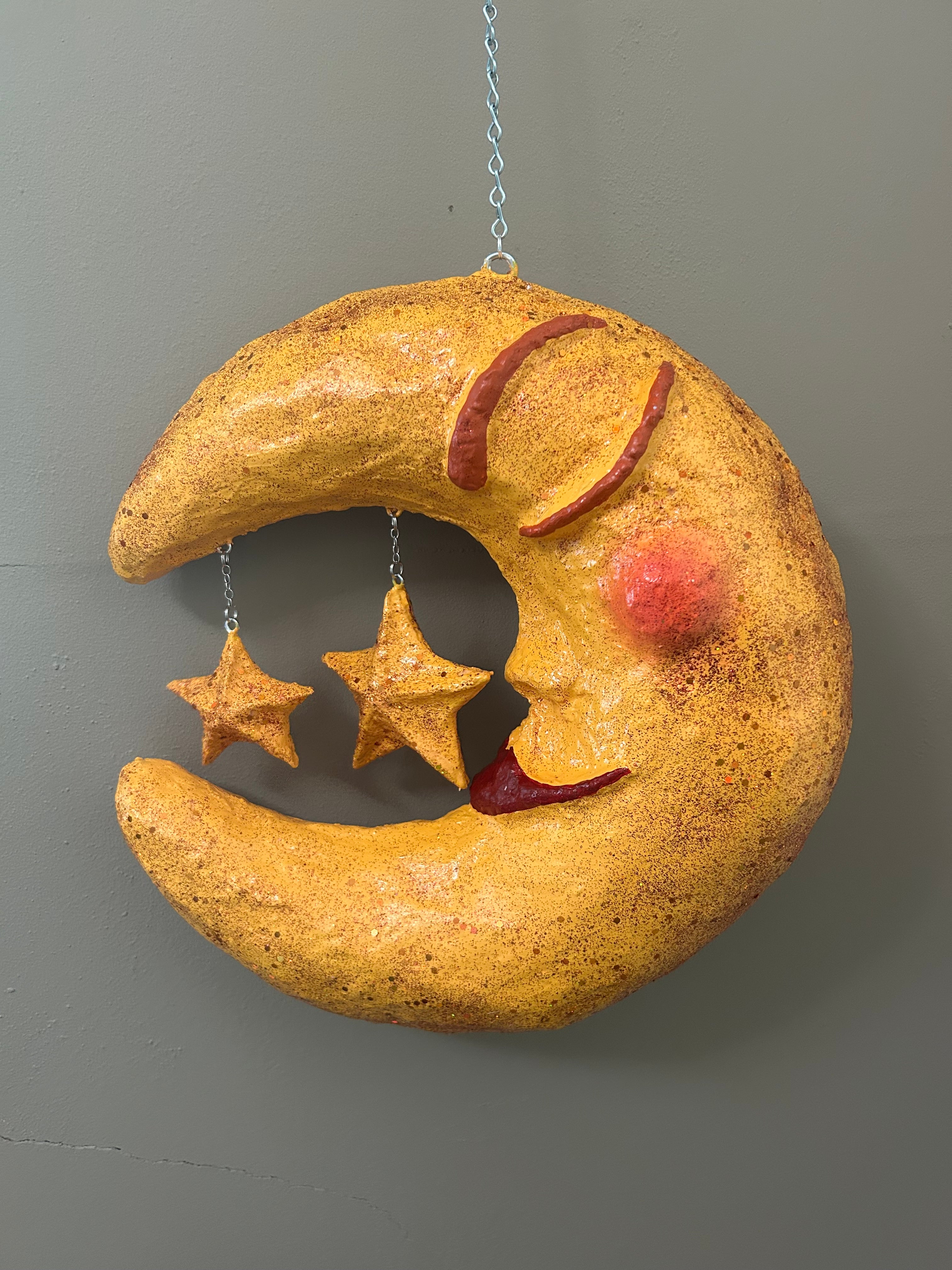 warm yellow hanging moon