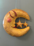 warm yellow hanging moon