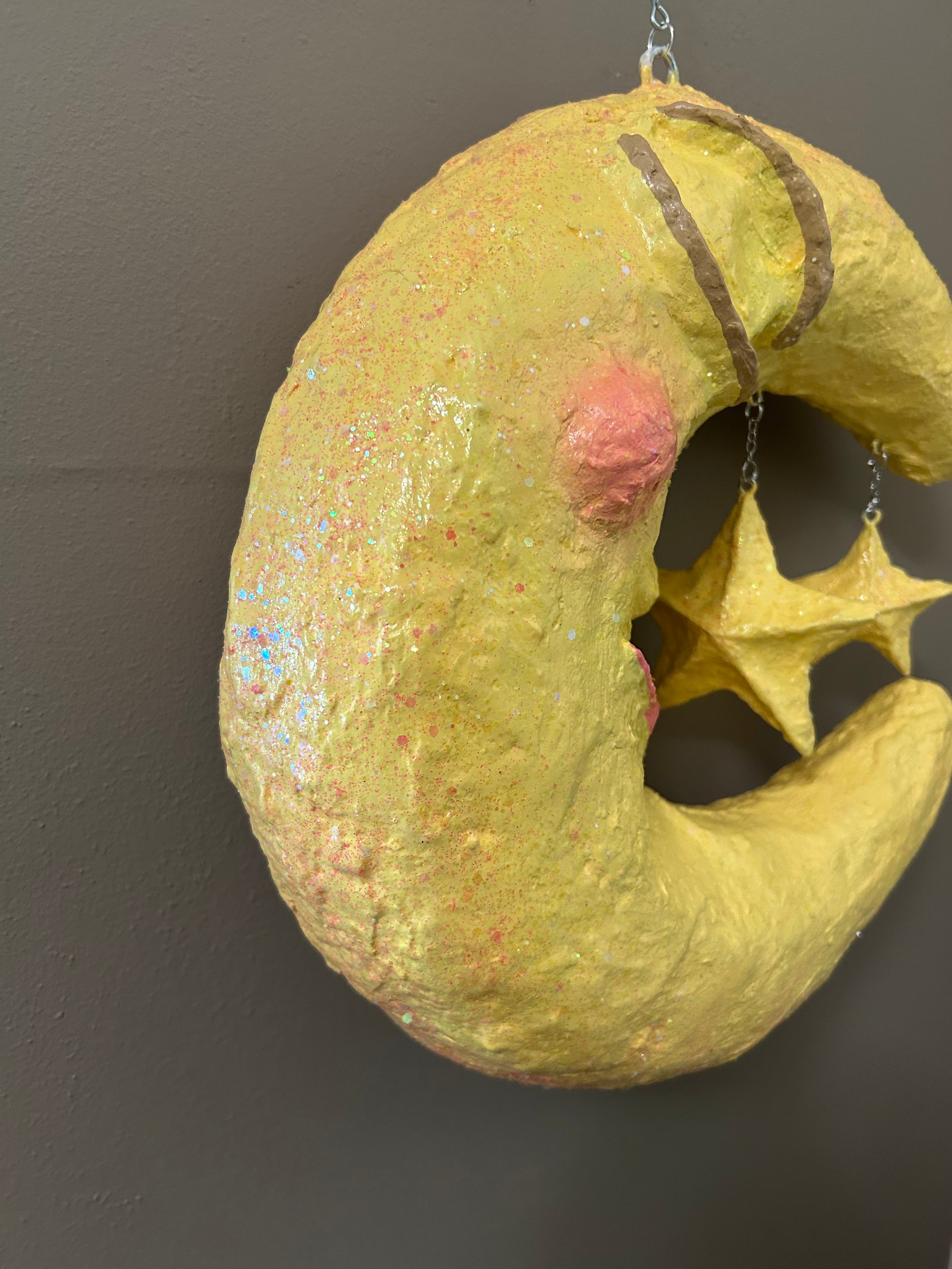 light yellow hanging moon